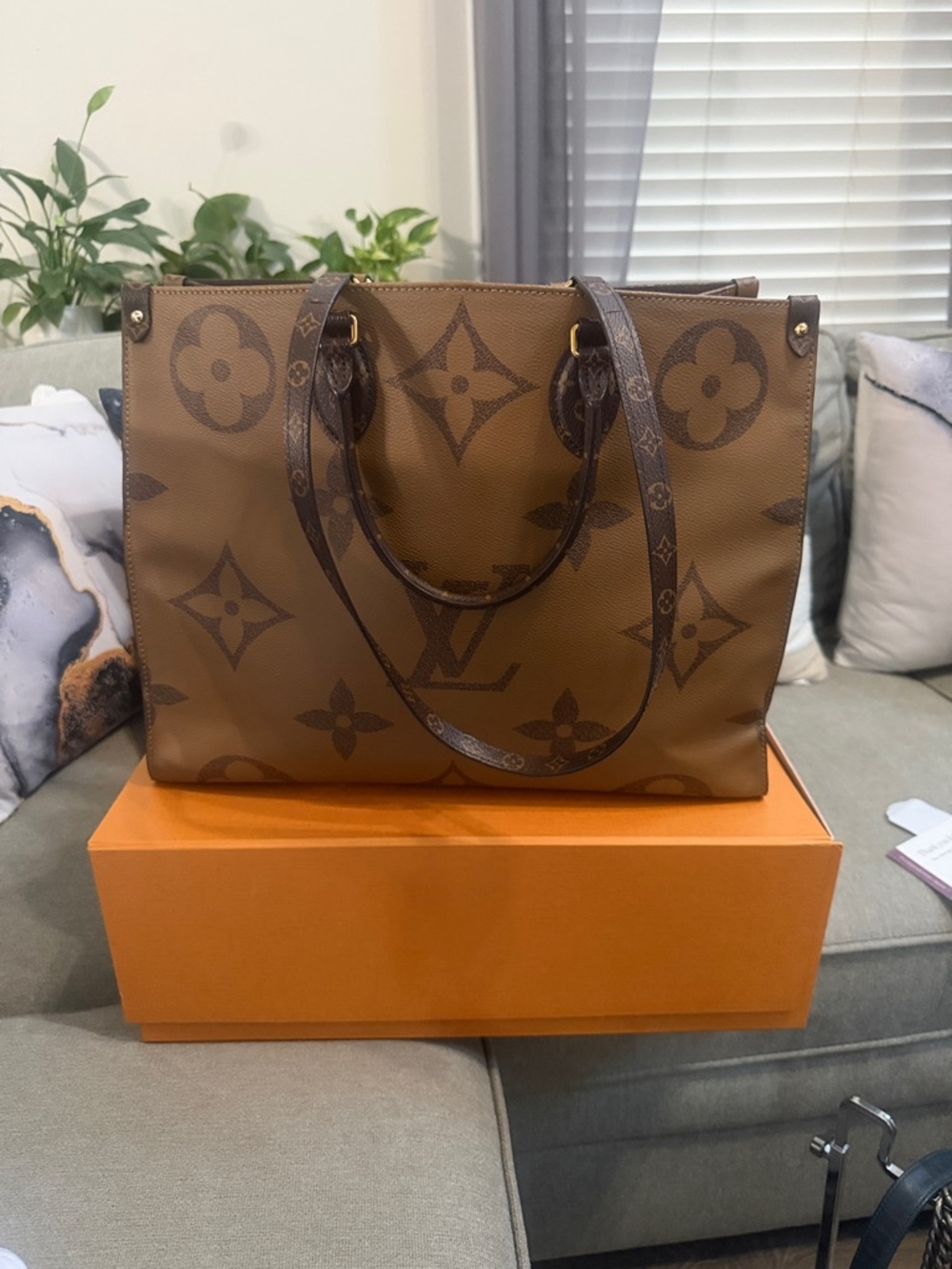 Louis Vuitton Brown Monogram Tote with Red Interior. - Picture 13 of 16